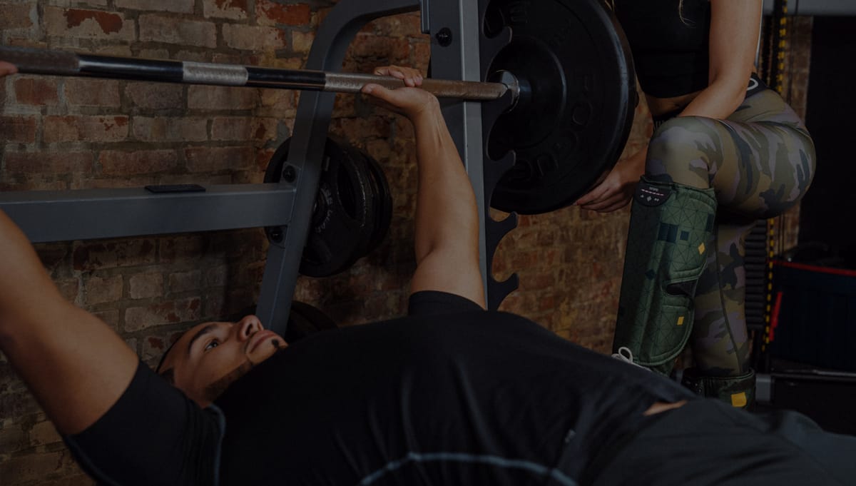 a-man-who-is-working-out-the-bench-press